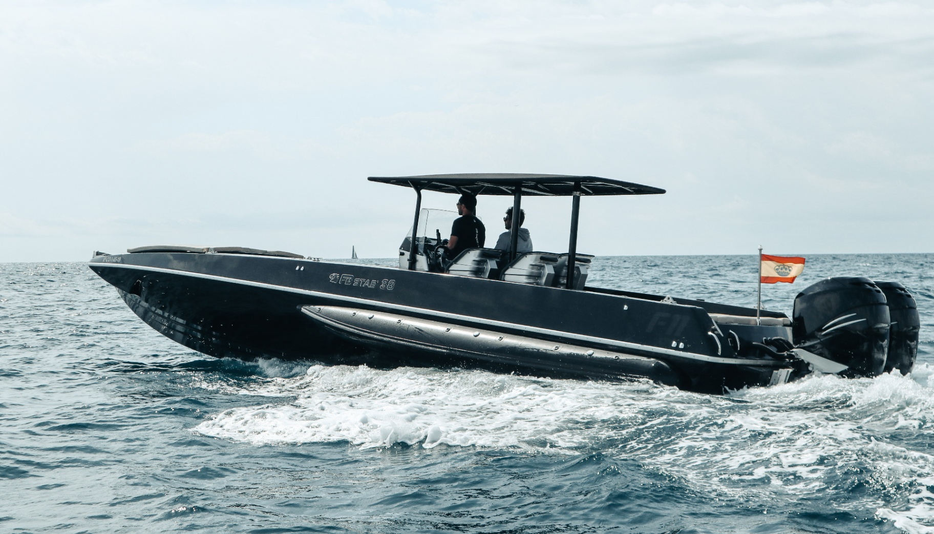 F11 Buzzi FB STAB 38 underway with Spanish ensign, Barcelona