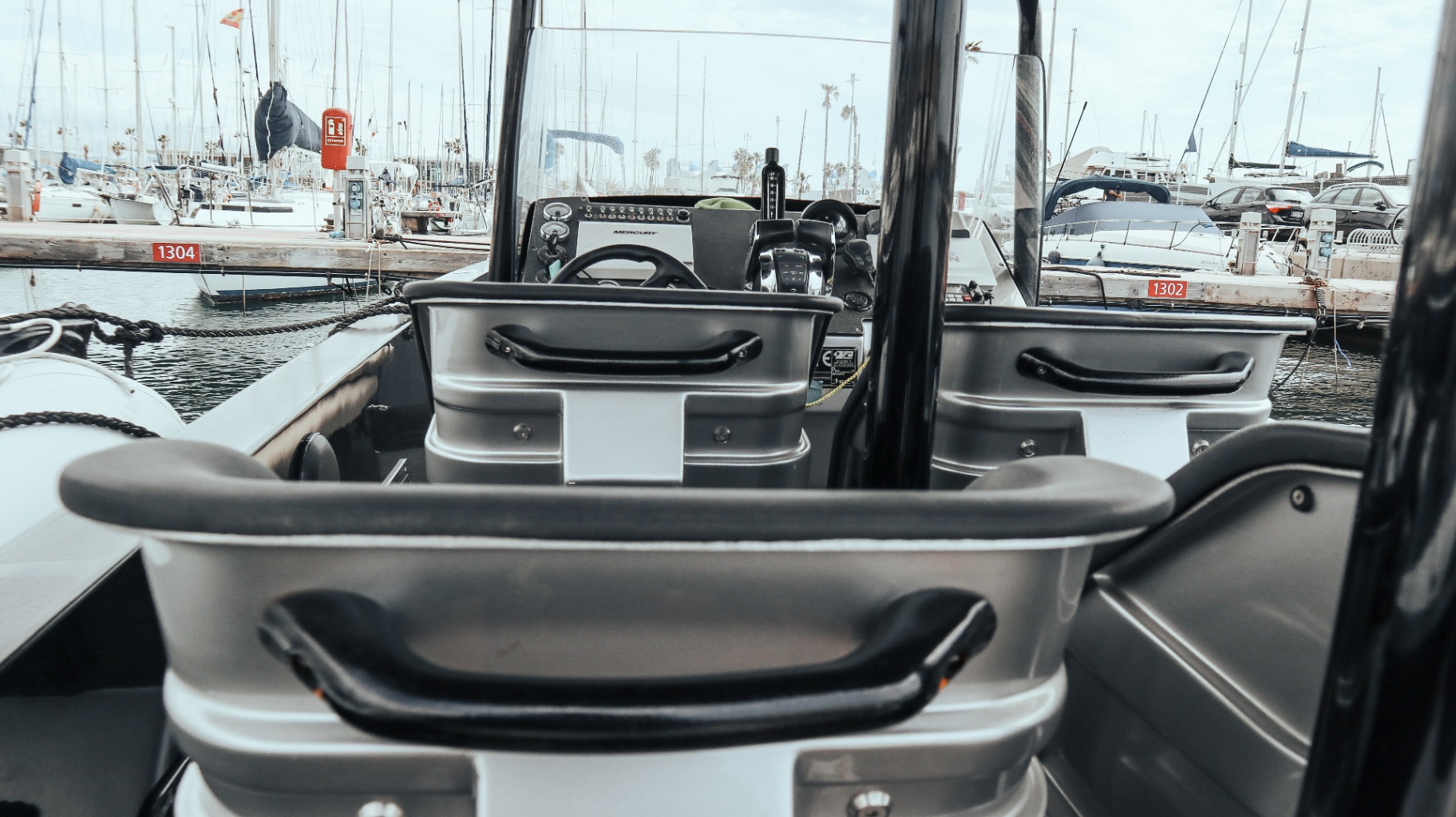 Looking forward from the rear cockpit at Barcelona marina