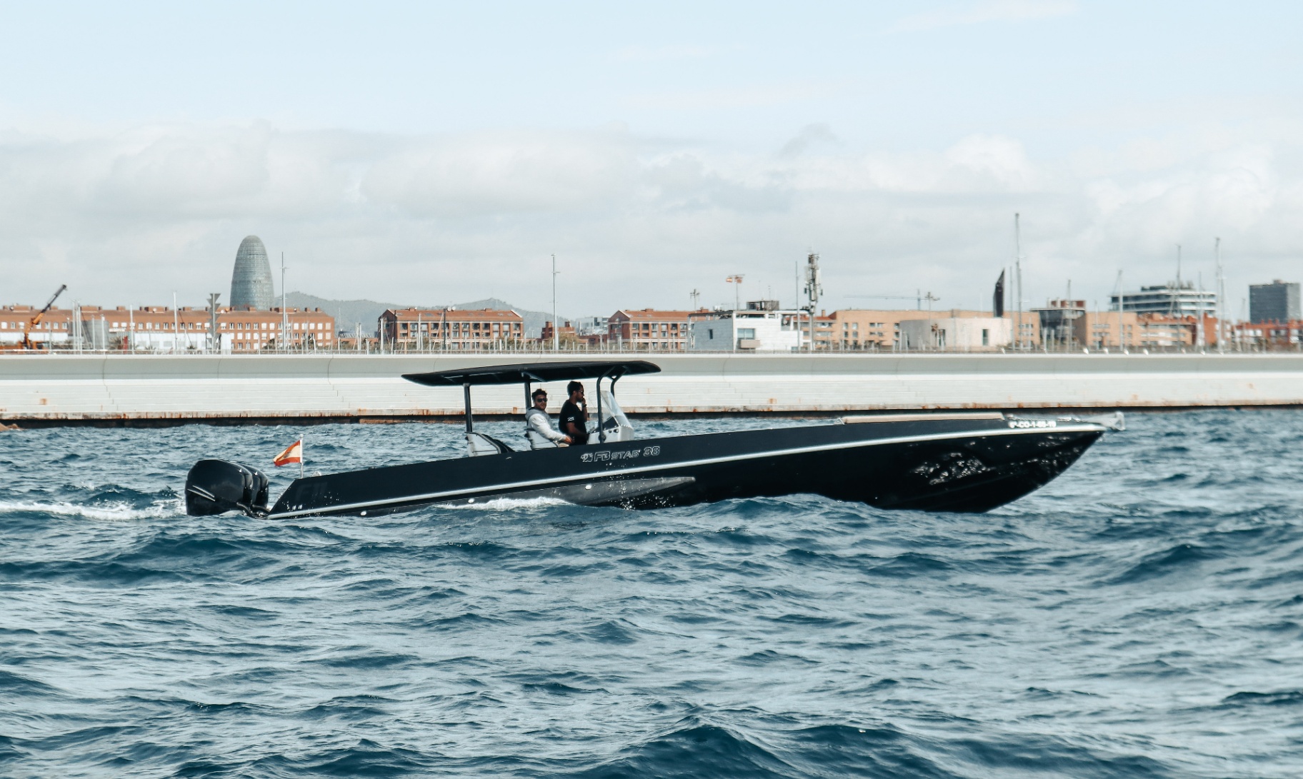 F11 Buzzi profile shot off Barcelona breakwater